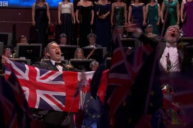Baritone Gerald Finley and conductor Sir Andrew Davis during the traditional renditional of Rule Britannia. But it was not shown on the screen in Northern Ireland. Screengrab from BBC