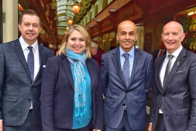 Secretary of State Karen Bradley pictured in Belfast city centre with, from left, Glyn Roberts, CEO of Retail NI, Rajest Rana, president, Belfast Chamber of Trade and Commerce and Colin Neill, CEO, Hospitality Ulster