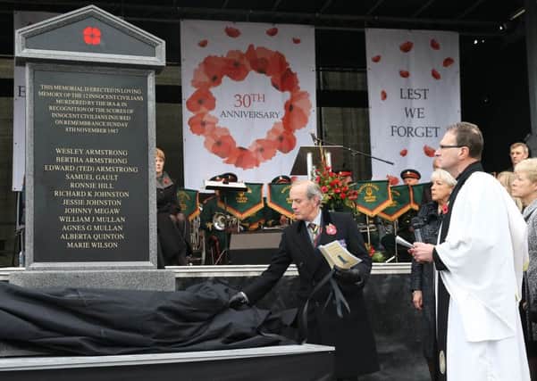 Rev Kenneth R J Hall from St Macartin's Cathedral Enniskillen with Viscount Brookeborough unveiling the memorial in  Enniskillen for the victims of the Poppy Day Bomb on 8  November 2017
. The memorial was then put into storage. Photo: Press Eye