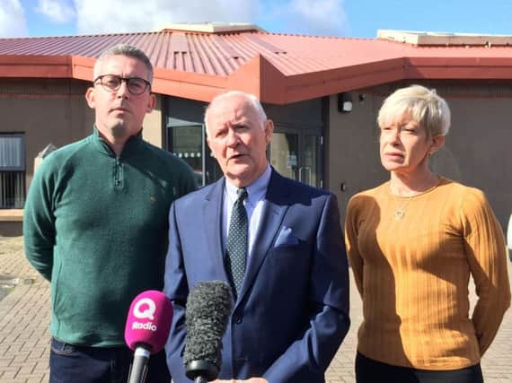 Liam Shannon, one of so-called Hooded Men, with Sinn Fein senator Niall O Donnghaile (left) and Sinn Fein councillor Mairead O'Donnell, reacts to European court decision outside the Short Strand Community Centre in east Belfast
