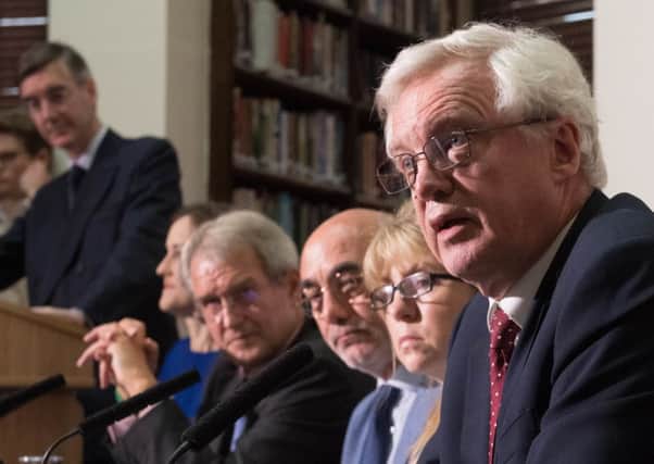 Owen Paterson, middle of pic looking to camera, and others including, from left, Jacob Rees Mogg, Theresa Villiers and, right, David Davis at Wednesays ERG paper launch at the Royal United Services Institute (RUSI) in Whitehall, London. Lord Trimble also spoke. Photo: Stefan Rousseau/PA Wire