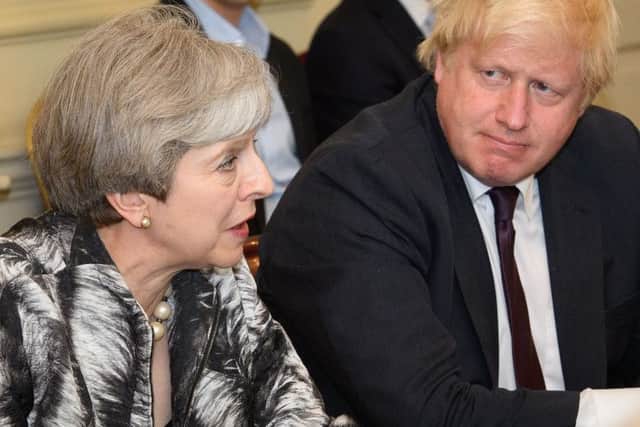 Photo dated 12/06/17 of Prime Minister Theresa May with Boris Johnson