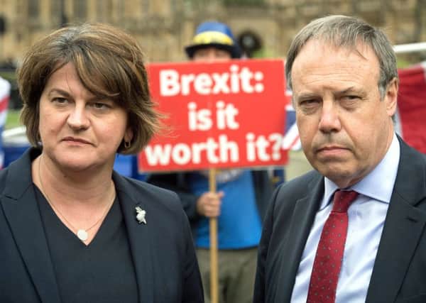 DUP leader Arlene Foster and deputy leader Nigel Dodds in Westminster, London, following a meeting with Prime Minister Theresa May and Northern Ireland Secretary Karen Bradley to discuss the powersharing impasse. Pic: Stefan Rousseau/PA Wire