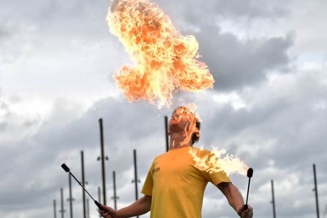 Ryan Luney, a three time Guinness World Record holder pictured in Belfast doing backflips while firebreathing. 
Pic Colm Lenaghan/Pacemaker