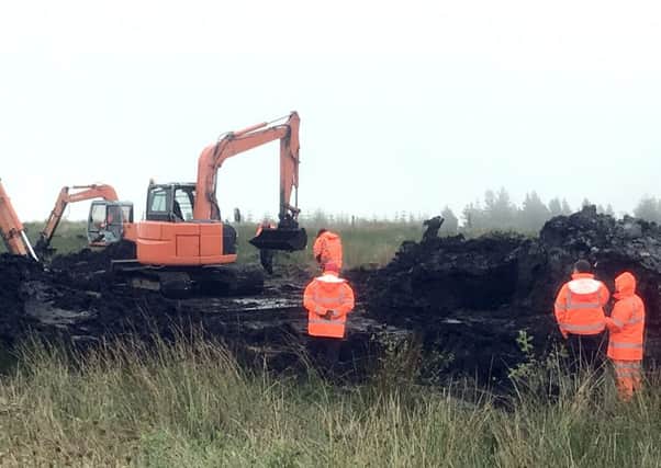 Excavators during the latest search for the remains of Columba McVeigh at Bragan Bog, Co Monaghan
