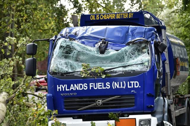 A falling tree hit an oil delivery lorry at Osborne Park in south Belfast during the heavy winds on Wednesday morning. Pic by Colm Lenaghan /Pacemaker