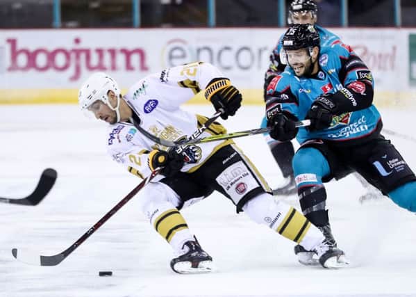 Belfast Giants' Blair Riley with Nottingham Panthers' Mark Hurtubise