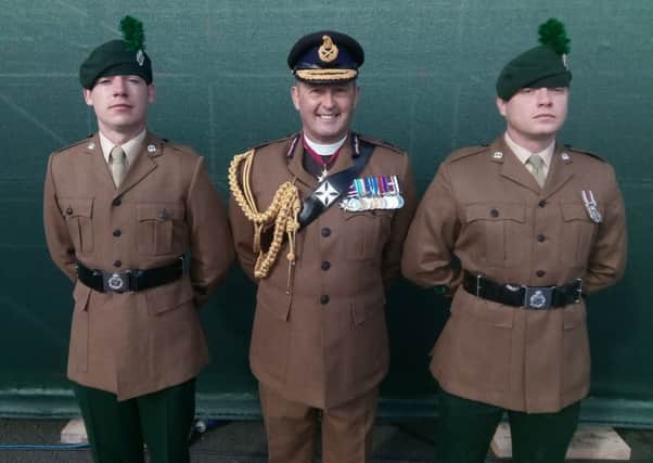 Rev Dr David Coulter, Chaplain General to HM Land Forces, with Ranger Jamie Lennon (left) and Ranger Gareth Lismore (right).