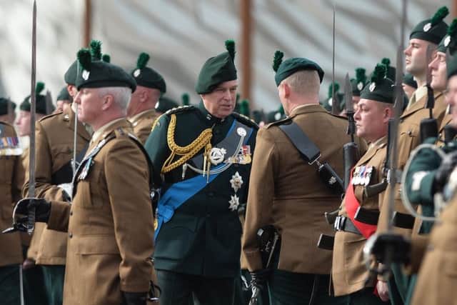 His Royal Highness The Duke of York meets the troops at the RIR presentation of colours parade at Titanic Slipways