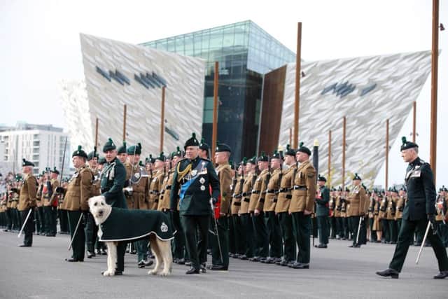 HRH The Duke of York standing behind Wolfhound Major Robert Moore and Irish Wolfhound Brian Boru X who proudly led the men of the 1st and 2nd Battalions of the Royal Irish Regiment on parade. Kelvin Boyes/Presseye/PA Wire