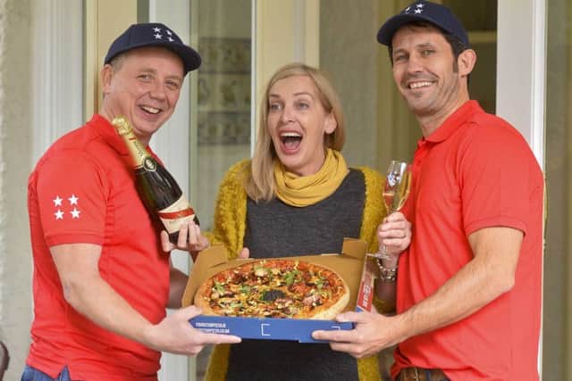 Londonderry lottery winner Anne Canavan, who won Â£1M on EuroMillions three years ago, received a special delivery of Northern Irelands most expensive pizza today from Ciaran Bradley (left) and Teague Whoriskey of Four Star Pizza, ahead of this Fridays massive EuroMillions super jackpot which is worth Â£115M.  The pizza chain has created the new limited edition Multi-Millionaire Pizza to cater for what the company describes as Northern Irelands growing millionaire market.  The Multi-Millionaire retails at a very tasty Â£269 and comes with a range of exclusive toppings including fresh caviar, French truffle peelings, baby octopus, mussels in a chilli sauce and squid  all topped off with a drizzle of edible 23 carat gold flake and washed down with a complimentary bottle of champagne.  If won by a single ticket-holder, this Fridays whopping Â£115M EuroMillions jackpot would create the UKs fourth biggest ever winner.