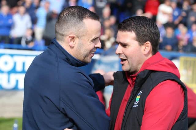Coleraine manager Rodney McAree and David Healy of Linfield. @INPHO/Brian Little