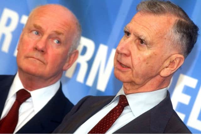 Canadian judge Peter Cory, above right, was appointed by the secretary of state John Reid, above left, to examine instances of alleged collusion in murders in Northern Ireland. Judge Cory highlighted several dictionary definitions of the word including to co-operate secretly: to have a secret understanding and he also added definitions of connive, a synonym of the verb collude. Photo by Simon Graham,Harrisons