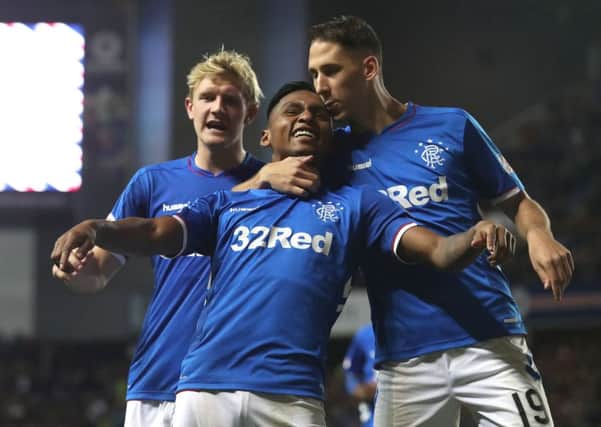 Rangers Alfredo Morelos is kissed by Nikola Katic as he celebrates scoring his side's third goal of the game