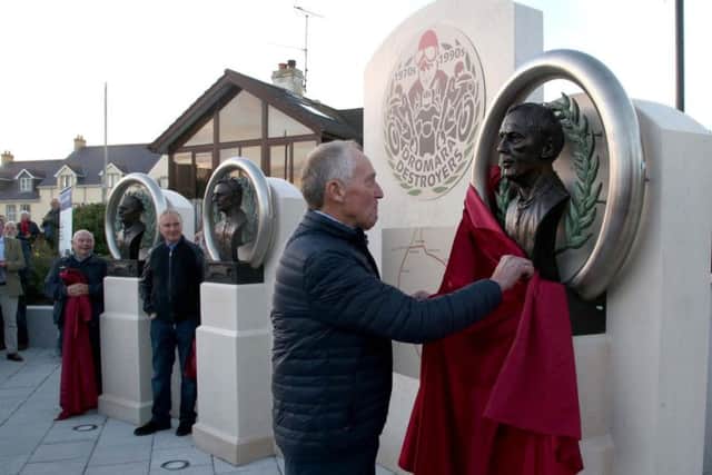 Ray McCullough unveils a bronze bust created as a tribute to the famous 'Dromara Destroyer' legend.