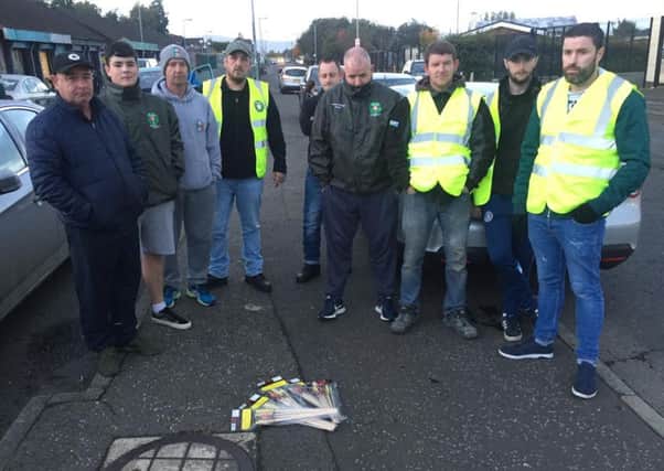 Saoradh members and supporters with fireworks they claim were confiscated in the Creggan area of Londonderry on Thursday
