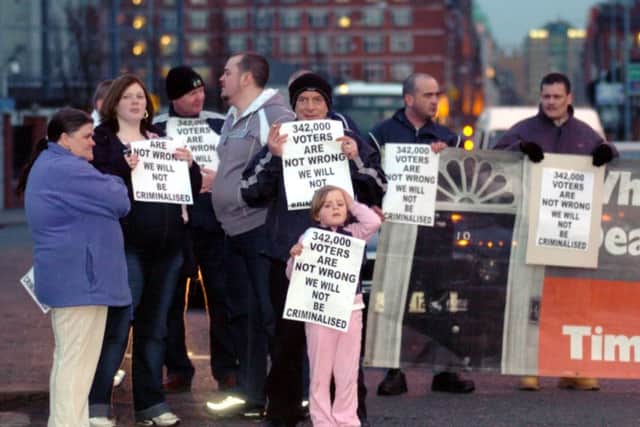 Supporters of Sinn Fein block the entrance to the Grosvenor Road entrance to the Westlink in Belfast in 2005 as a protest to the IMC implicating the Sinn Fein leadership in the Northern Bank Robbery 
Picture Stephen Wilson