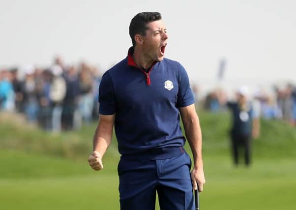 Team Europe's Rory McIlroy celebrates his birdie on the 6th during the Foursomes match on day one of the Ryder Cup at Le Golf National, Saint-Quentin-en-Yvelines, Paris.