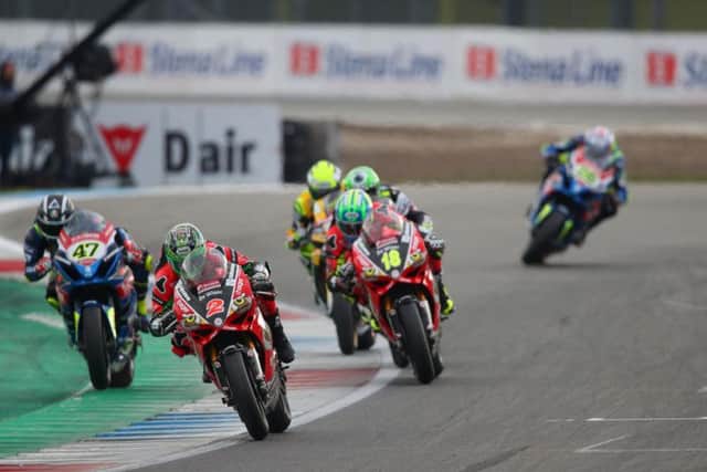 Glenn Irwin (2) finished fifth and fourth in the Bennetts British Superbike races on the PBM Be Wiser Ducati at Assen.