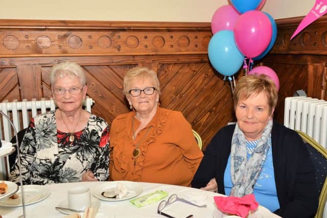 Enjoying the afternoon tea at the launch of the Link Project in Larne Town Hall are Emma Ferguson, Liz McAdorey and Helen Hamilton. INLT 40-005-PSB