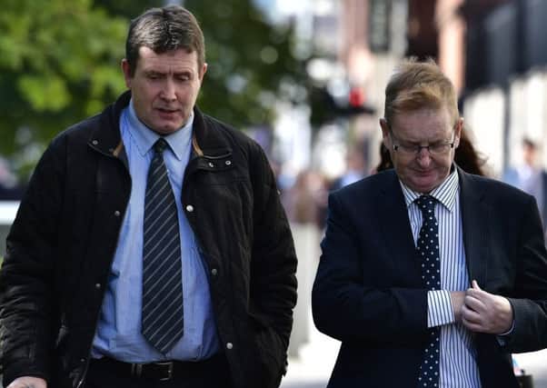 Colin Worton, who lost his brother in the Kingsmills massacre, and victims' campaigner Willie Frazer, at a previous preliminary inquest hearing