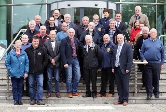 Members of Dundrod and District Motorcycle Club, the Ulster Grand Prix Supporters Club and Dundrod residents pictured outside Lisburn and Castlereagh City Councils offices following Monday's Planning Committee meeting. Pic by Stephen Davison