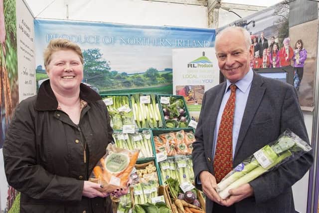 Gwen McKee and Roy Lyttle with the veg which they supply to Tesco in Northern Ireland