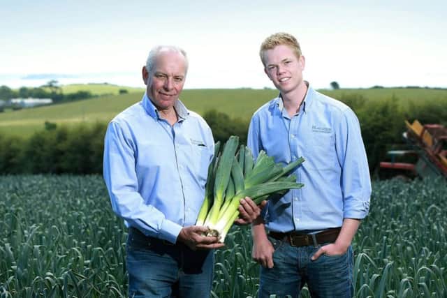 Roy Lyttle with his son Roy junior on their farm