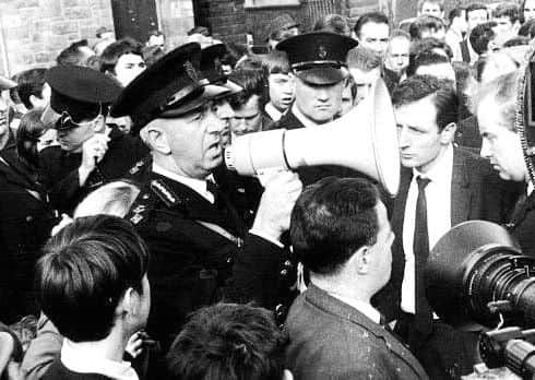 Police and demonstrators at Duke Street in Londonderrys Waterside on October 5, 1968