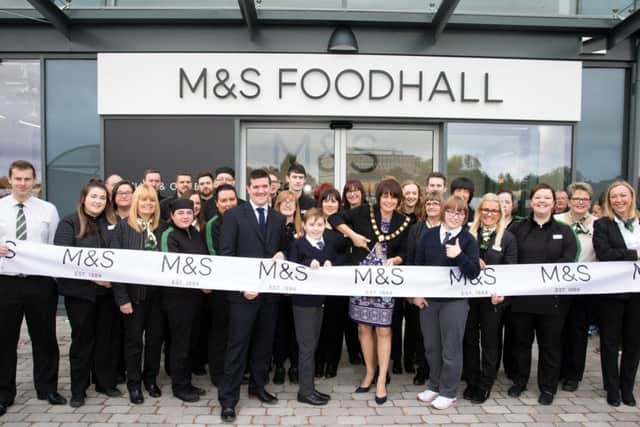 Pictured at the opening of the new M&S Foodhall in Craigavon today are John Woods, M&S Craigavon Store Manager, Lord Mayor of Armagh City, Banbridge & Craigavon, Councillor Julie Flaherty, along with Malachy Kofa (12) and Brid McKeown (15) pupils at Ceara Special School in Craigavon.