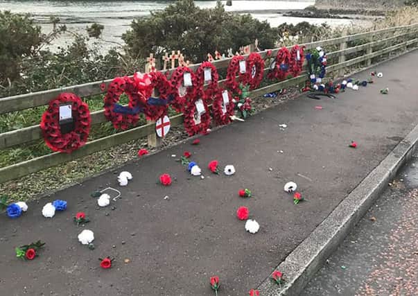 The scene earlier this week when the memorial to 18 British soldiers killed by the IRA at Narrow Water castle was vandalised.