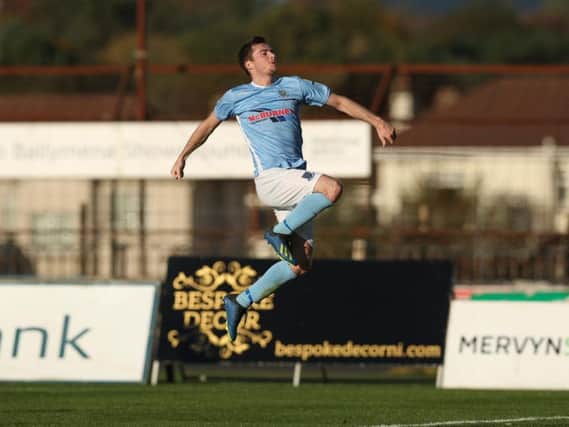 United's Andy McGriory celebrates after scoring against Newry City