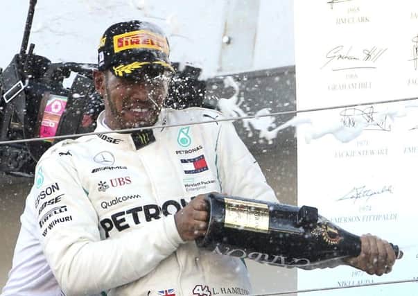 Mercedes driver Lewis Hamilton celebrates