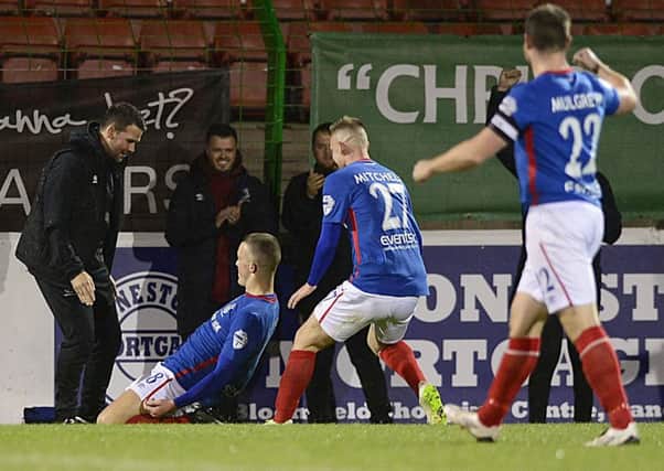 Linfield's Michael O'Connor celebrates his winning goal against Glentoran at The Oval.