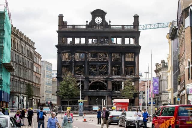 Primark says it is doing all it can to resolve the issue of the safety cordon around their main Belfast store, which was destroyed by fire in August. Liam McBurney/PA Wire