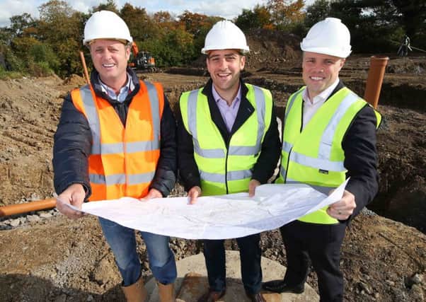 Rowallane Construction MD Jim Campbell with Jamesy Hagan, MD Seventh Developments and Gary Ferris, senior manager Close Brothers