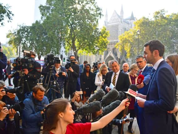 Ashers bakery owners Daniel and Amy McArthur (right), speak to media outside the Supreme Court in London, where five justices unanimously ruled on Wednesday that the Christian owners did not discriminate against gay rights activist Gareth Lee on the ground of sexual orientation.