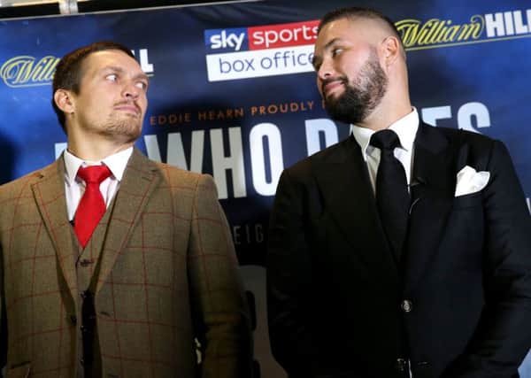 Oleksandr Usyk (left) and Tony Bellew during the press conference in Manchester