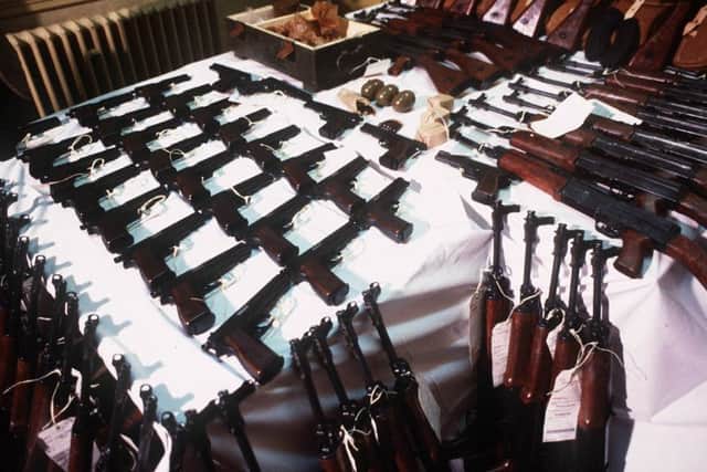 WHERE ARE THEY NOW? Weapons put on show by the RUC after they stopped two cars packed full of guns destined for the UDA in 1988. Photo: Pacemaker