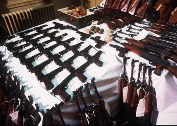 Weapons put on show by the RUC after they stopped two cars packed full of guns destined for the UDA in 1988. Photo: Pacemaker