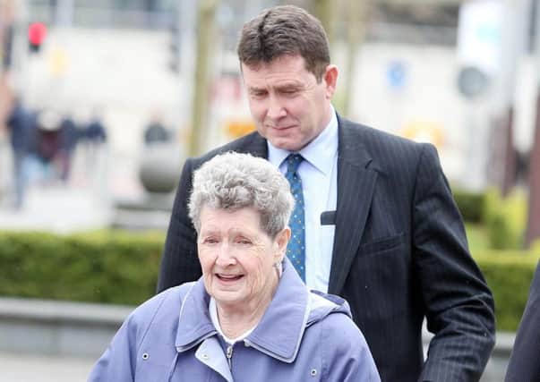 Bea Worton, 89, leaves Belfast High Court with her son Colin during the legal challenge against McCreesh Park. Photo: Jonathan Porter/PressEye