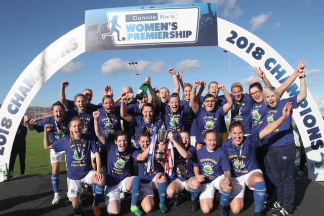 Linfield Ladies celebrate their third Danske Bank Womens Premiership title win in a row.
