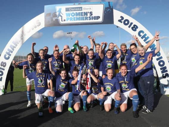 Linfield Ladies celebrate their third Danske Bank Womens Premiership title win in a row.