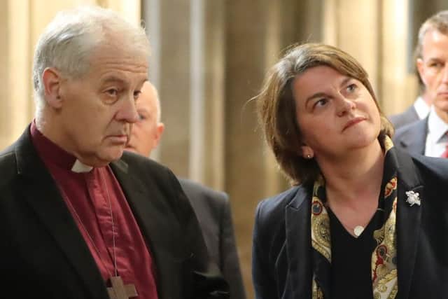 DUP leader Arlene Foster is given a tour of  St Patrick's Cathedral in Dublin by Church of Ireland Archbishop of Dublin and Bishop of Glendalough, Michael Jackson.