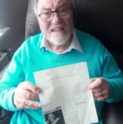 Robert with correspondence from Ian Paisley during his Ulster Protestant Volunteer days