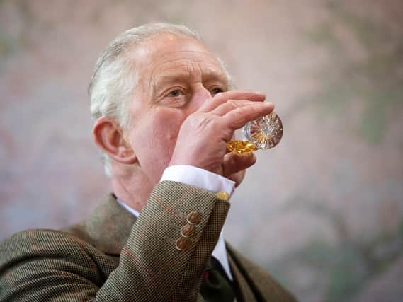 The Prince of Wales, known as the Duke of Rothesay while in Scotland, takes part in a whisky tasting during a visit to the Royal Lochnagar Distillery at Crathie on Royal Deeside.