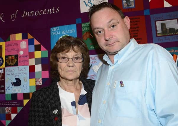 Gina Murray (mother of Leanne Murray killed in Shankill bomb) with her son Gary.
Picture By: Arthur Allison/Pacemaker Press