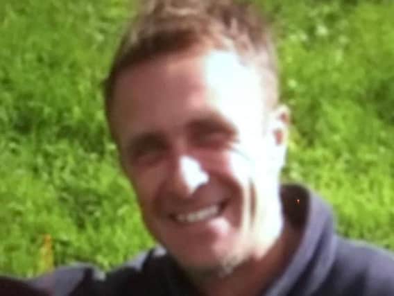 The PSNI has issued a more recent photograph of missing man, Robert Holmes.