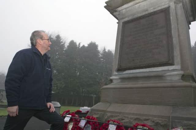 Cllr Billy Henry pictured at Ballymena and District War Memorial.