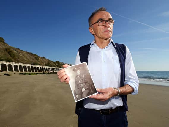 File photo dated 5/20/2018 of Danny Boyle holds a photograph of Private Walter Bleakley.